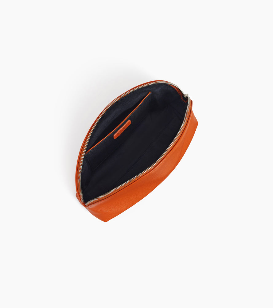 Half-moon toiletry bag in grained leather