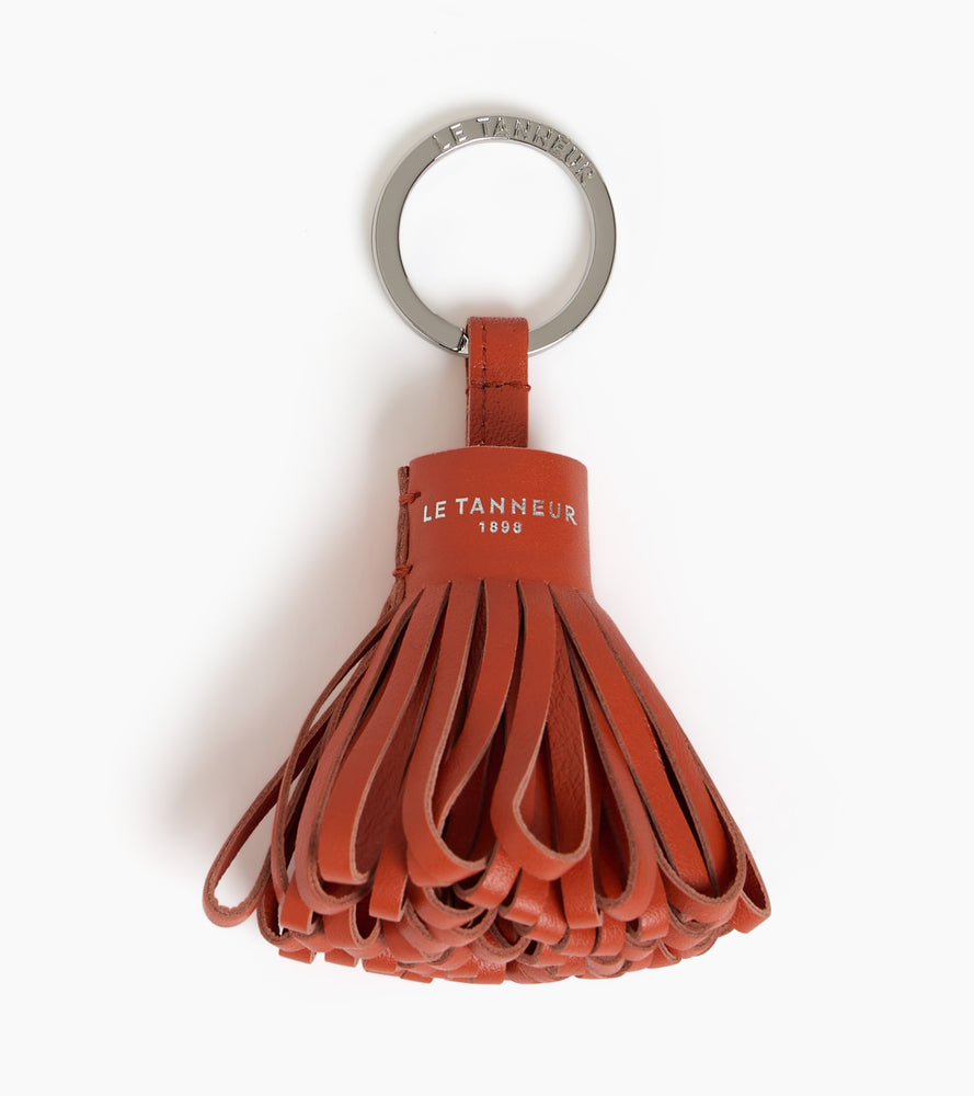 Porte clés pompons en cuir lisse